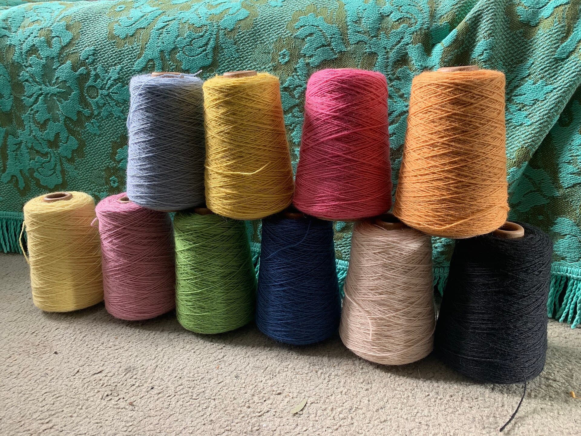 Cottonized pineapple leaf fiber blended into yarn spools at a spinning mill